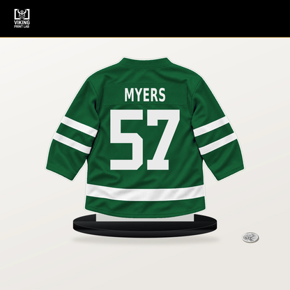 Tyler Myers number 57 Dallas Stars jersey stand with included black base.