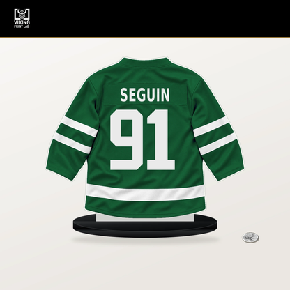 Tyler Seguin number 91 Dallas Stars jersey stand with included black base.