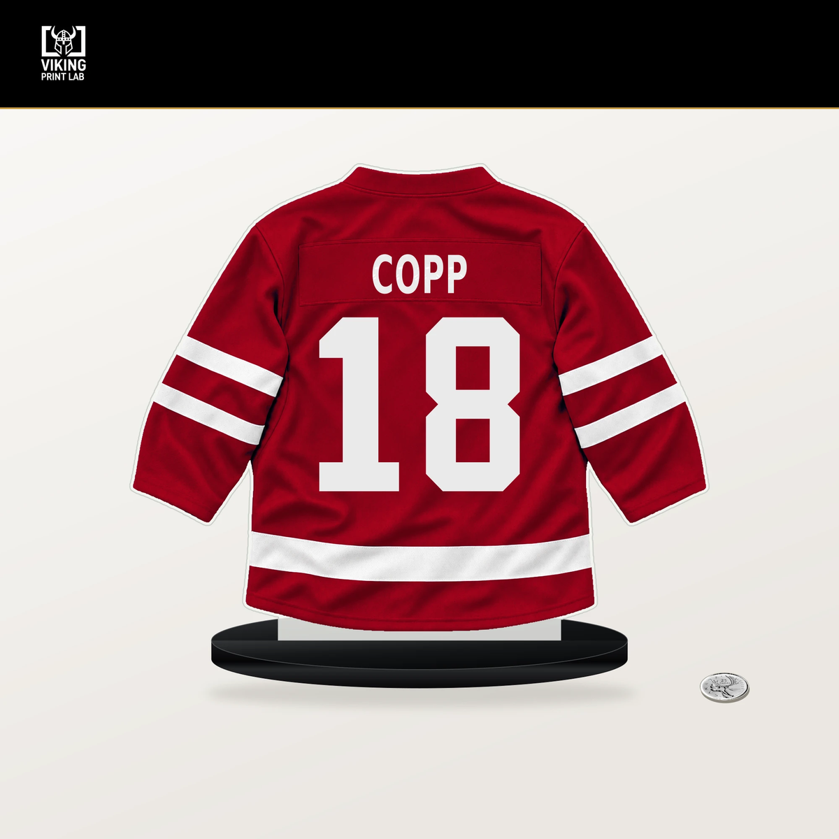 Andrew Copp number 18 Detroit Red Wings jersey stand with included black base.