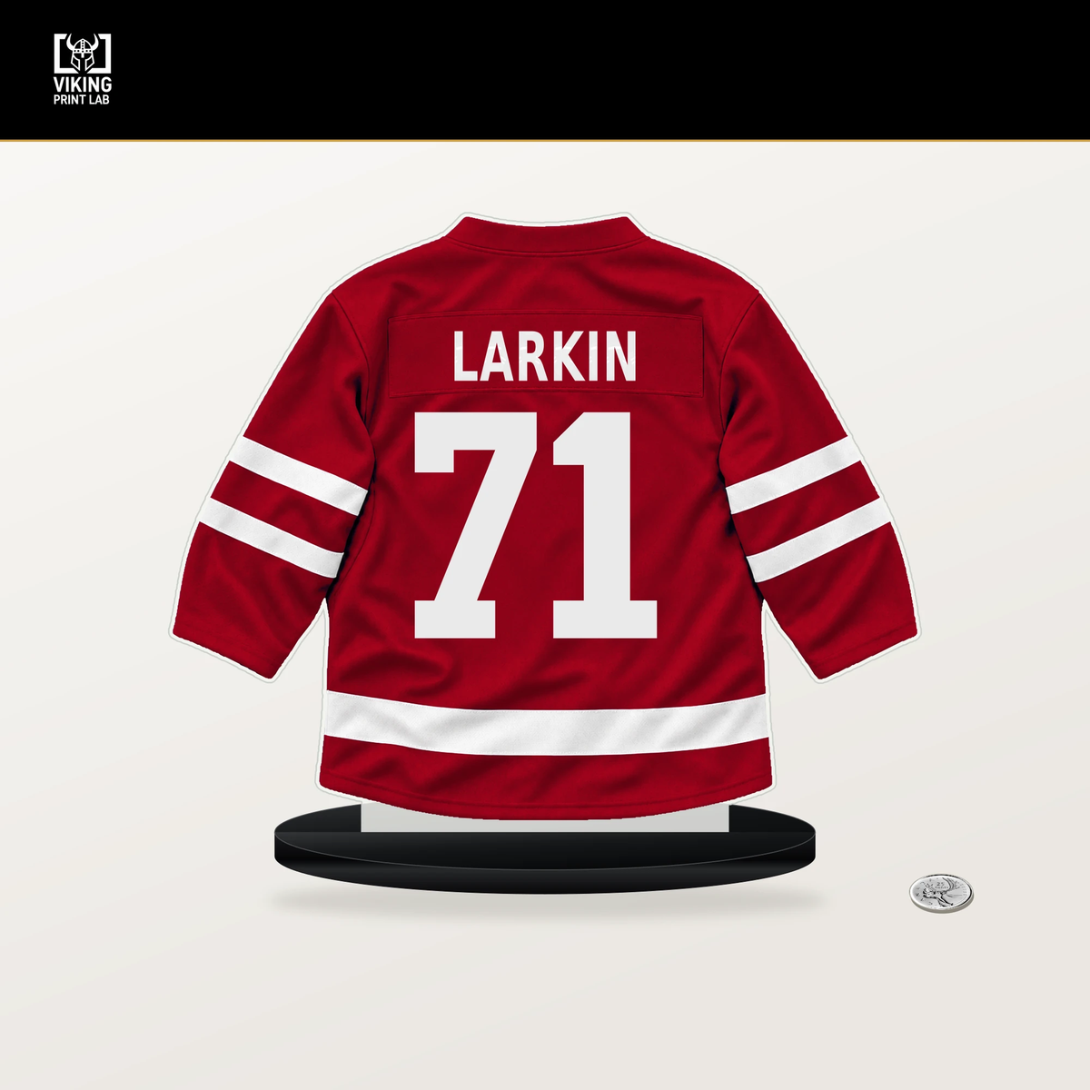 Dylan Larkin number 71 Detroit Red Wings jersey stand with included black base.