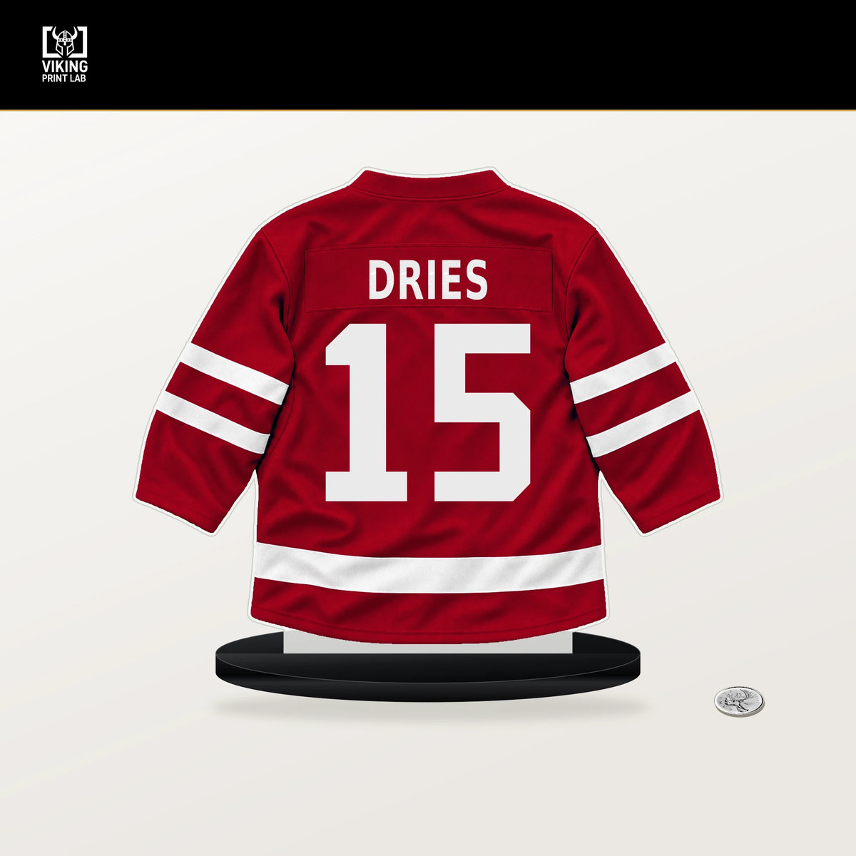 Sheldon Dries number 15 Detroit Red Wings jersey stand with included black base.
