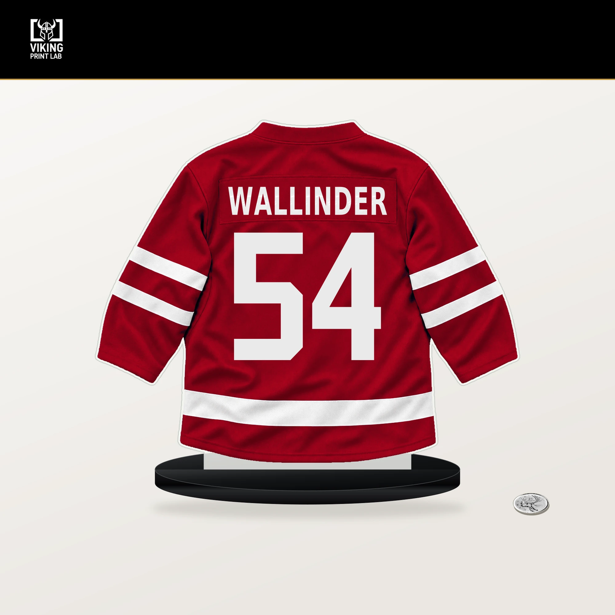 William Wallinder number 54 Detroit Red Wings jersey stand with included black base.