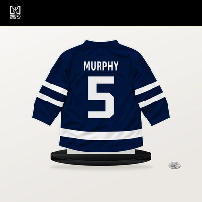 Connor Murphy number 5 Edmonton Oilers jersey stand with included black base.