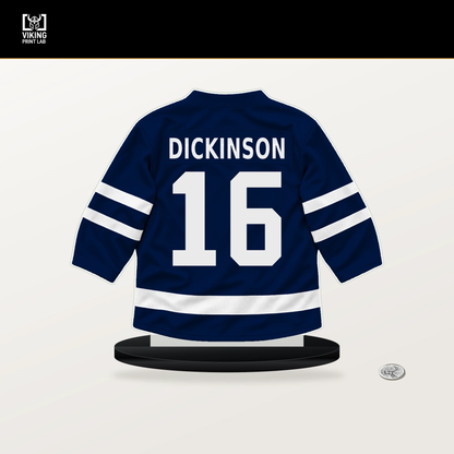 Jason Dickinson number 16 Edmonton Oilers jersey stand with included black base.