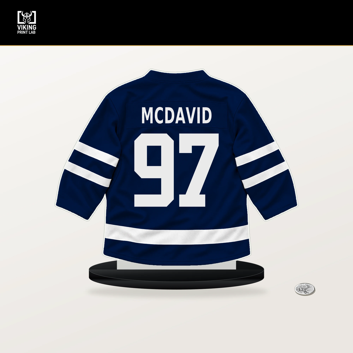 Connor McDavid number 97 Edmonton Oilers jersey stand with included black base.