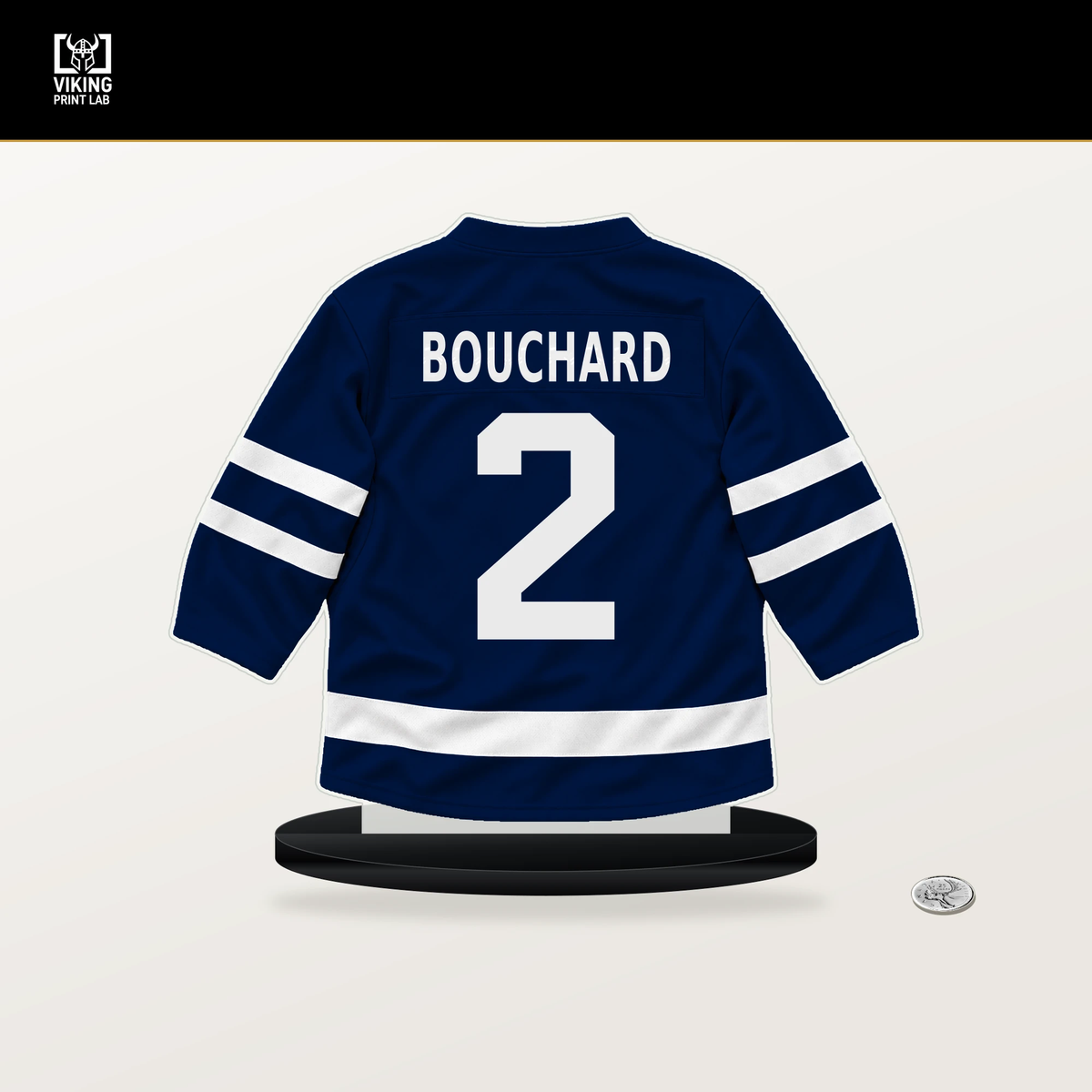 Evan Bouchard number 2 Edmonton Oilers jersey stand with included black base.