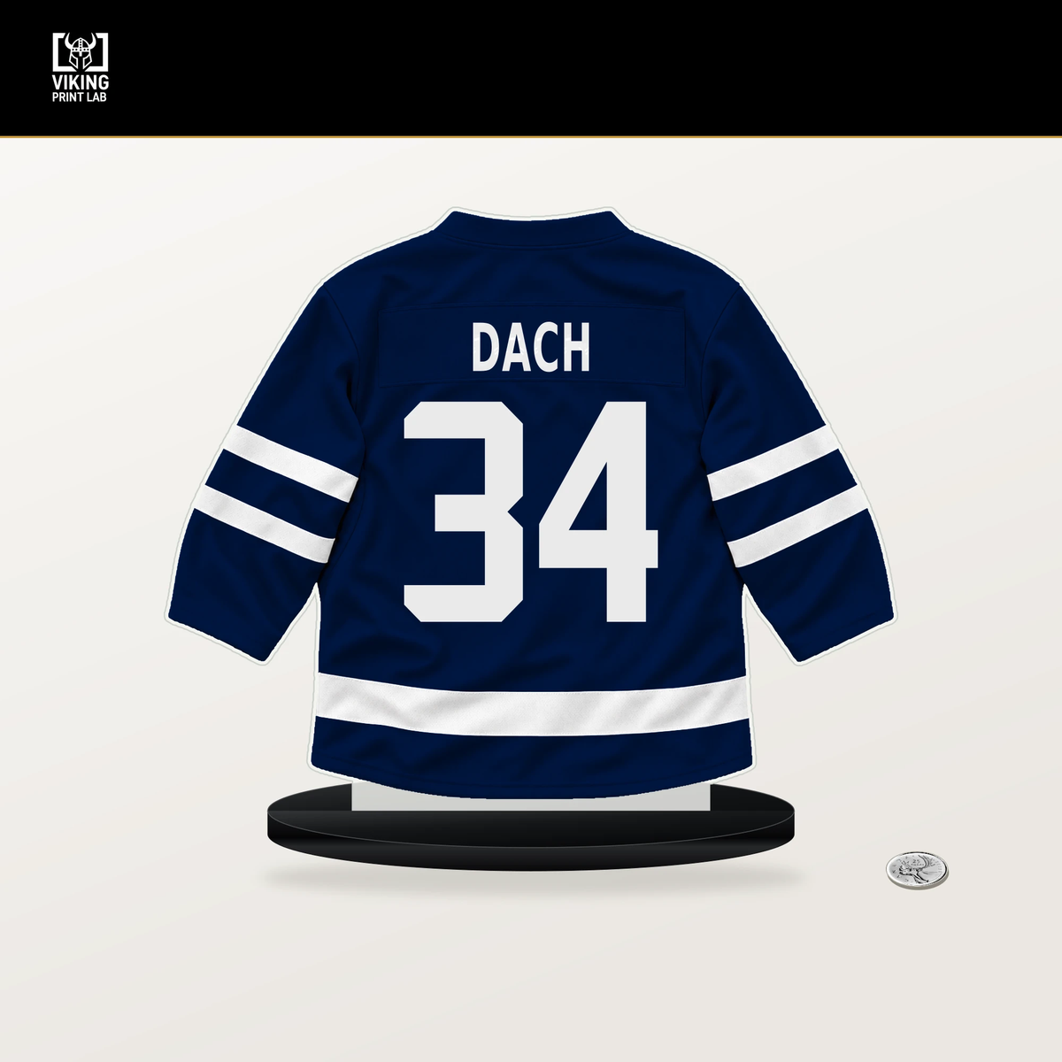 Colton Dach number 34 Edmonton Oilers jersey stand with included black base.