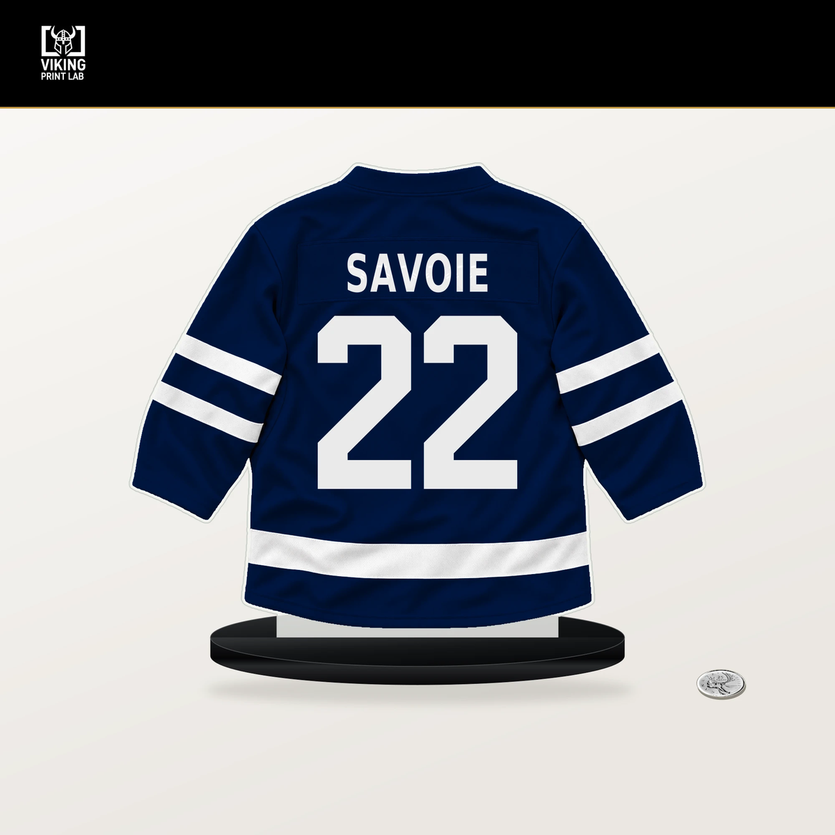 Matt Savoie number 22 Edmonton Oilers jersey stand with included black base.