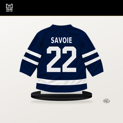 Matt Savoie number 22 Edmonton Oilers jersey stand with included black base.