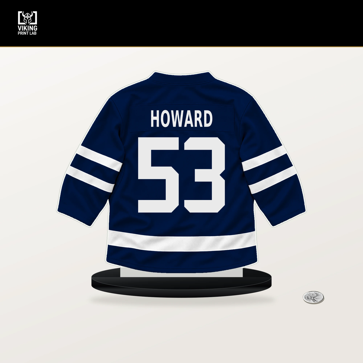 Isaac Howard number 53 Edmonton Oilers jersey stand with included black base.