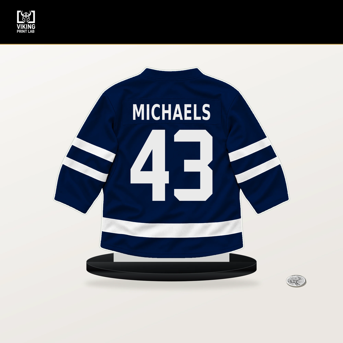 Owen Michaels number 43 Edmonton Oilers jersey stand with included black base.