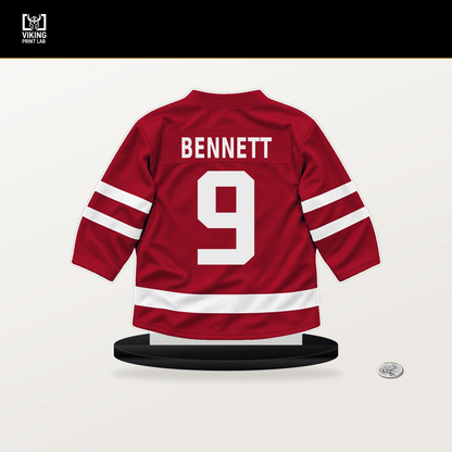 Sam Bennett number 9 Florida Panthers jersey stand with included black base.