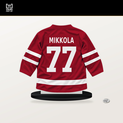 Niko Mikkola number 77 Florida Panthers jersey stand with included black base.