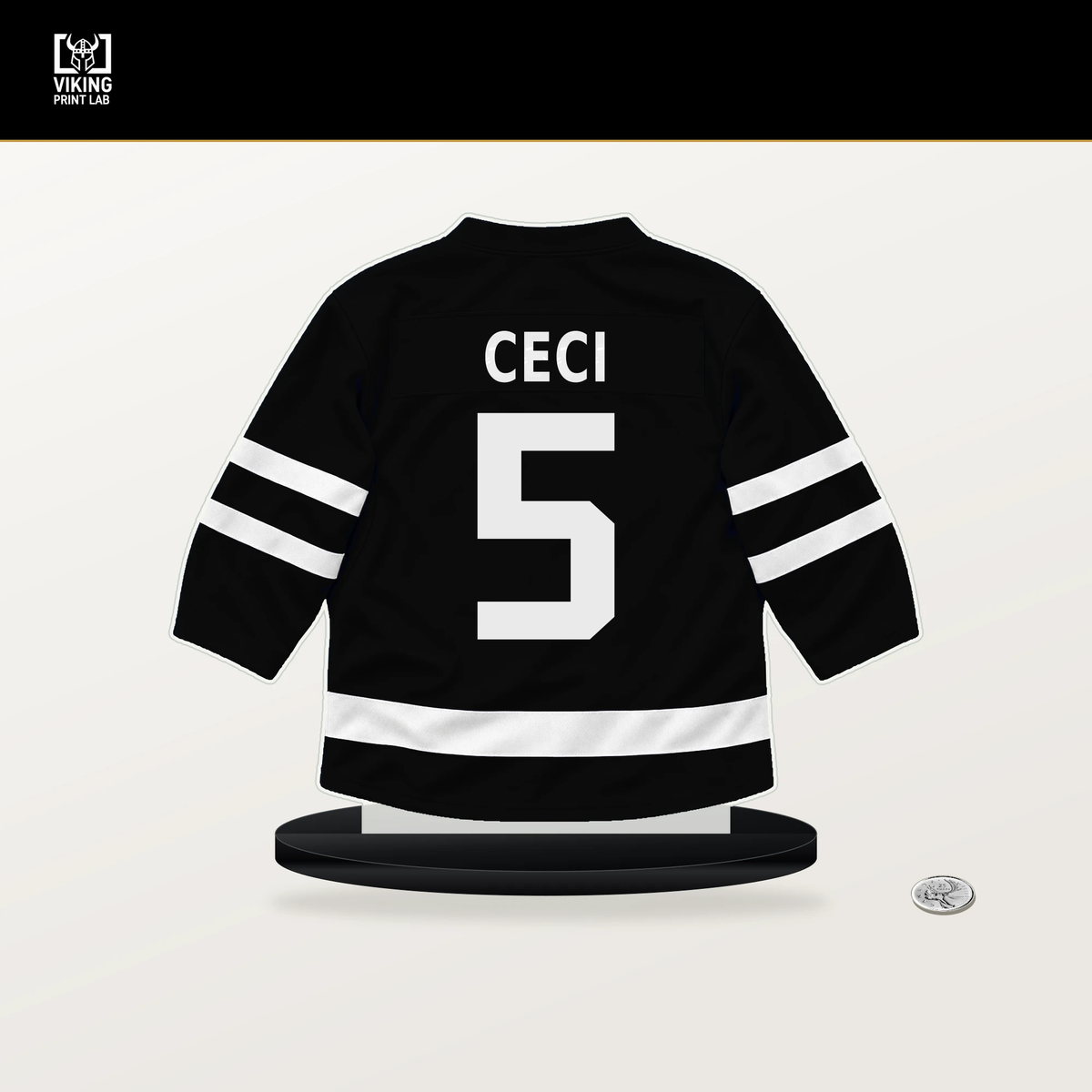 Cody Ceci number 5 Los Angeles Kings jersey stand with included black base.