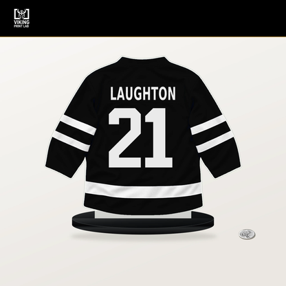 Scott Laughton number 21 Los Angeles Kings jersey stand with included black base.