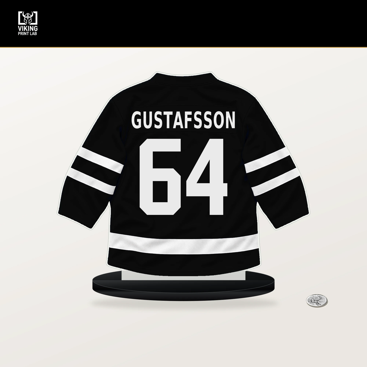 Erik Gustafsson number 64 Los Angeles Kings jersey stand with included black base.