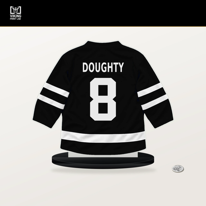 Drew Doughty number 8 Los Angeles Kings jersey stand with included black base.