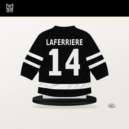 Alex Laferriere number 14 Los Angeles Kings jersey stand with included black base.