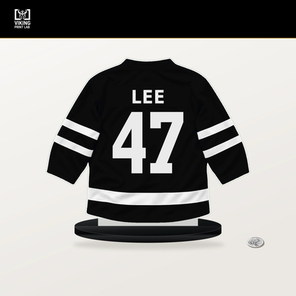 Andre Lee number 47 Los Angeles Kings jersey stand with included black base.