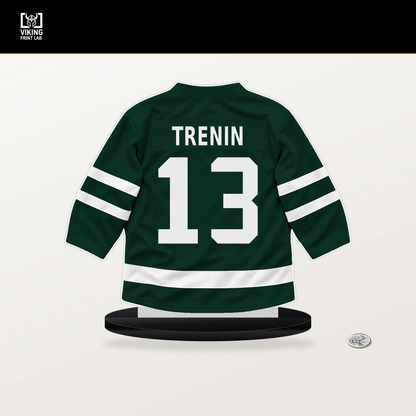 Yakov Trenin number 13 Minnesota Wild jersey stand with included black base.