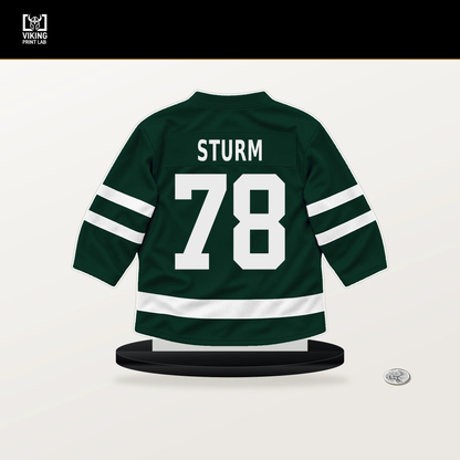 Nico Sturm number 78 Minnesota Wild jersey stand with included black base.