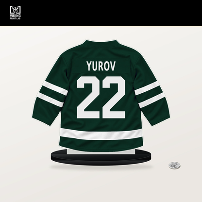 Danila Yurov number 22 Minnesota Wild jersey stand with included black base.