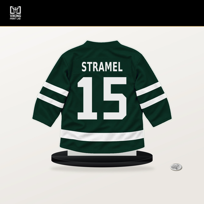 Charlie Stramel number 15 Minnesota Wild jersey stand with included black base.