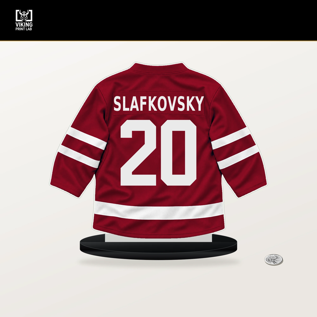 Juraj Slafkovsky number 20 Montreal Canadiens jersey stand with included black base.
