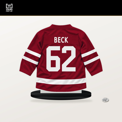 Owen Beck number 62 Montreal Canadiens jersey stand with included black base.