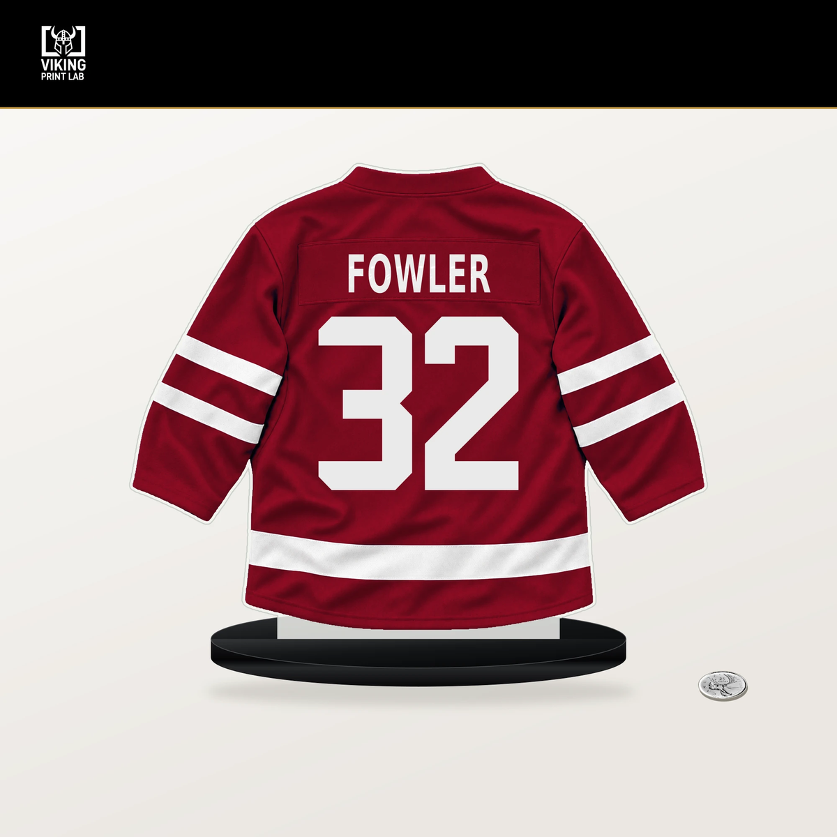 Jacob Fowler number 32 Montreal Canadiens jersey stand with included black base.