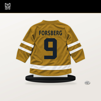 Filip Forsberg number 9 Nashville Predators jersey stand with included black base.