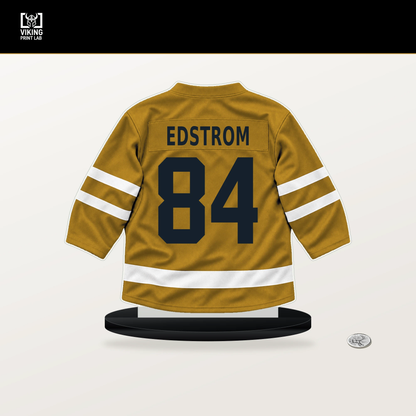 Adam Edstrom number 84 Nashville Predators jersey stand with included black base.