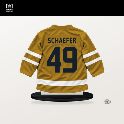 Reid Schaefer number 49 Nashville Predators jersey stand with included black base.