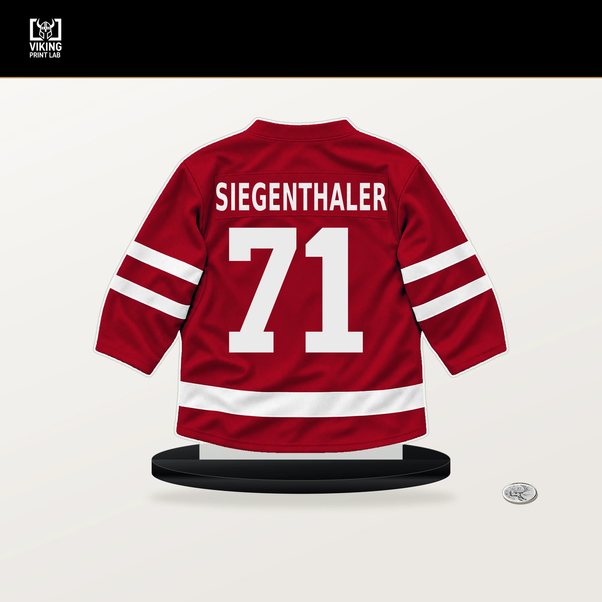 Jonas Siegenthaler number 71 New Jersey Devils jersey stand with included black base.