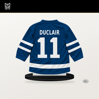 Anthony Duclair number 11 New York Islanders jersey stand with included black base.