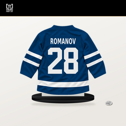 Alexander Romanov number 28 New York Islanders jersey stand with included black base.