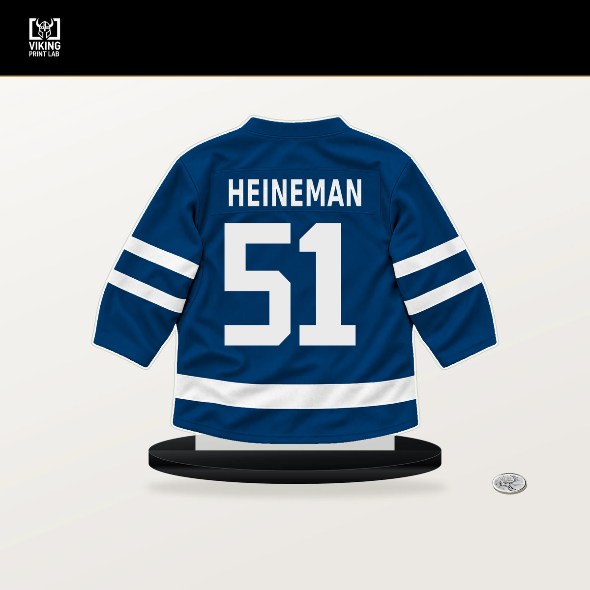 Emil Heineman number 51 New York Islanders jersey stand with included black base.