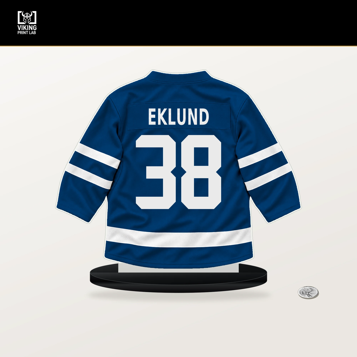 Victor Eklund number 38 New York Islanders jersey stand with included black base.