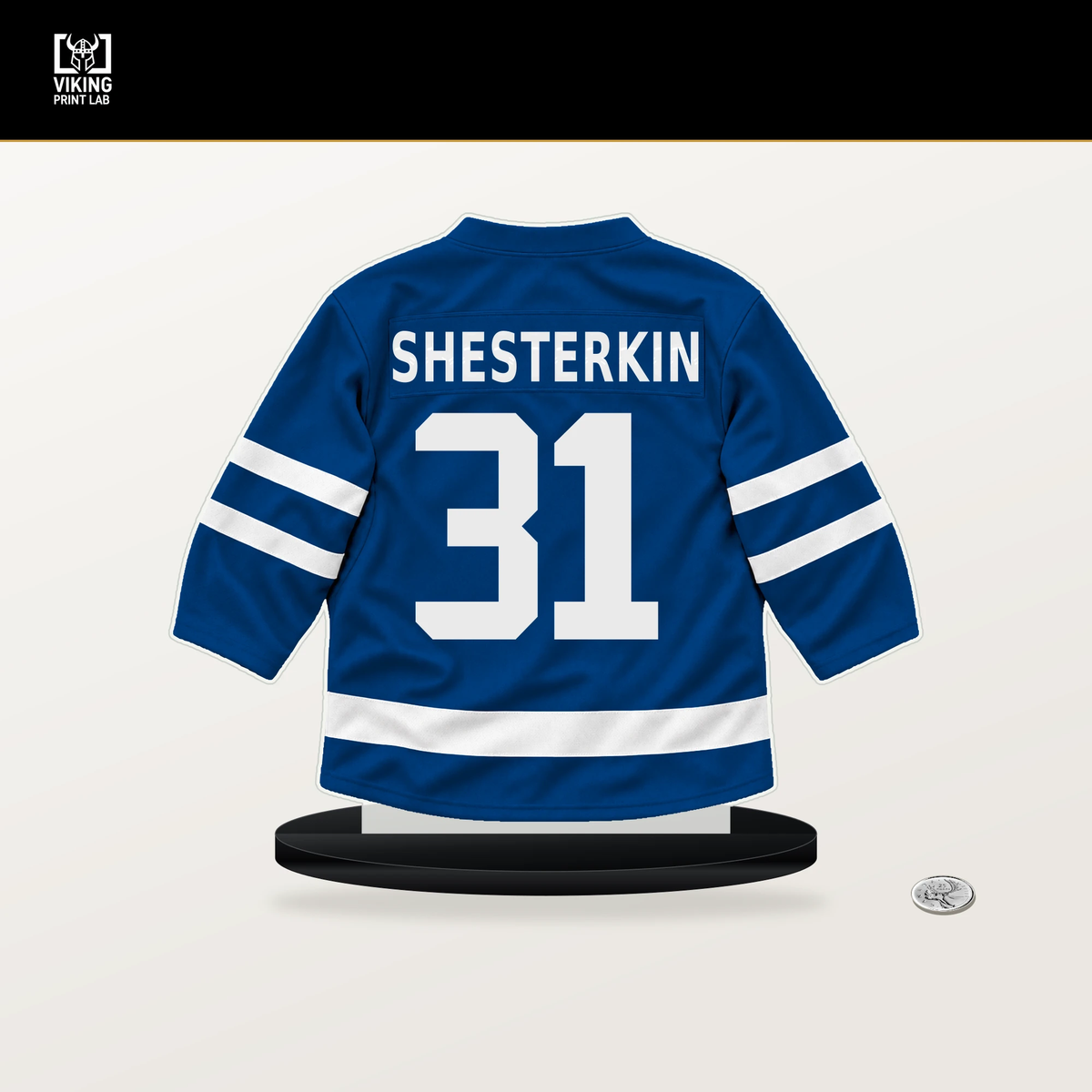 Igor Shesterkin number 31 New York Rangers jersey stand with included black base.