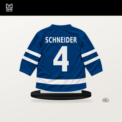 Braden Schneider number 4 New York Rangers jersey stand with included black base.
