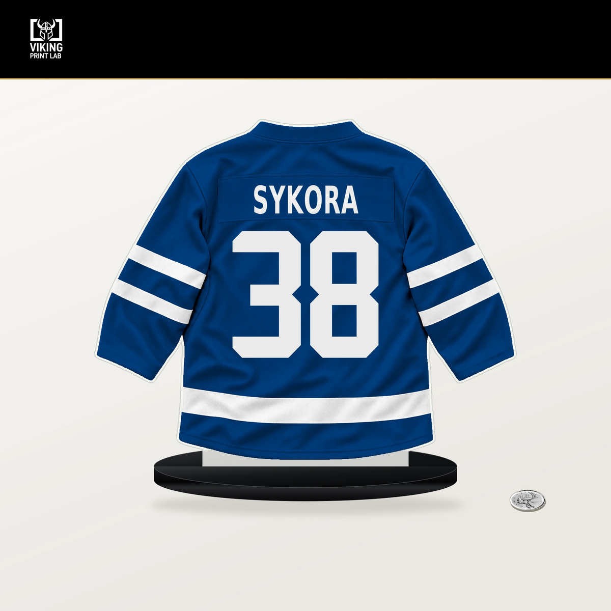 Adam Sykora number 38 New York Rangers jersey stand with included black base.
