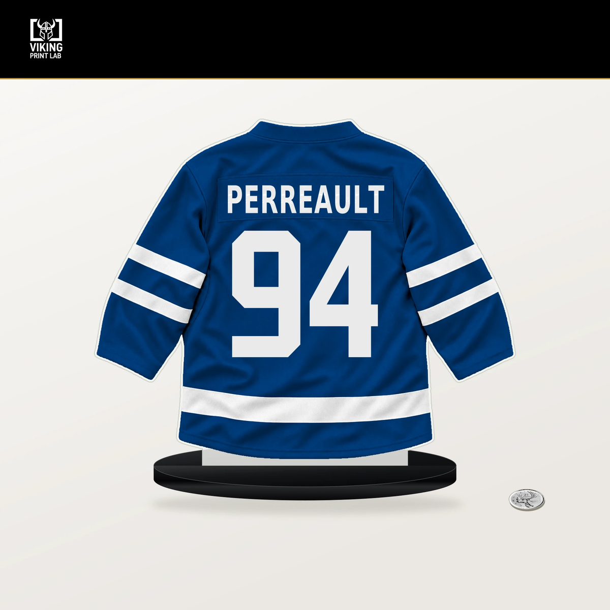 Gabe Perreault number 94 New York Rangers jersey stand with included black base.