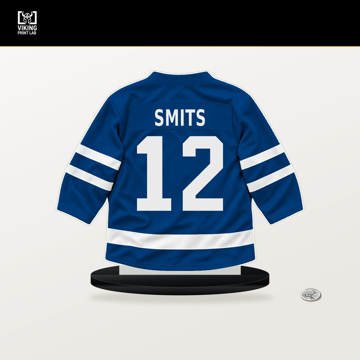Alberts Smits number 12 New York Rangers jersey stand with included black base.