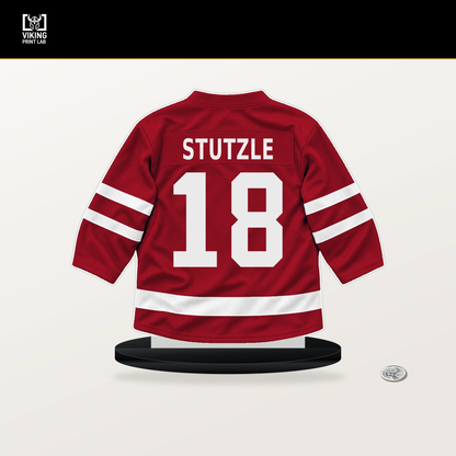 Tim Stutzle number 18 Ottawa Senators jersey stand with included black base.