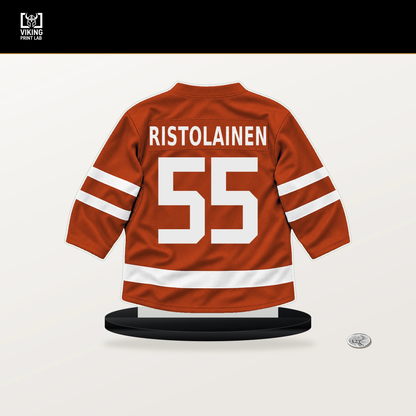 Rasmus Ristolainen number 55 Philadelphia Flyers jersey stand with included black base.