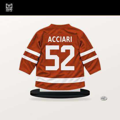 Noel Acciari number 52 Philadelphia Flyers jersey stand with included black base.