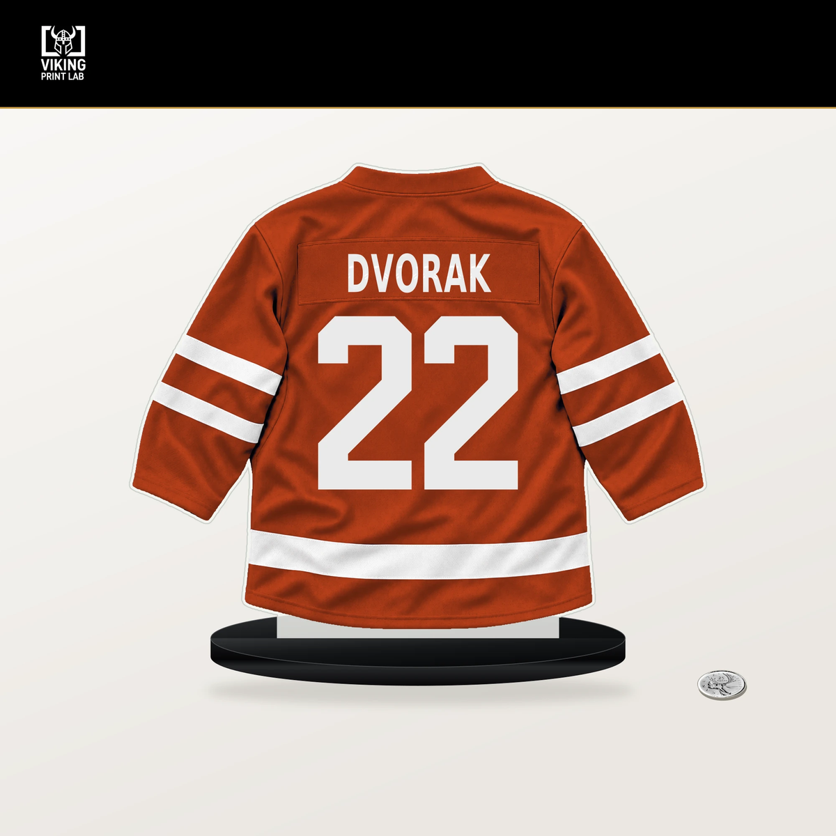 Christian Dvorak number 22 Philadelphia Flyers jersey stand with included black base.