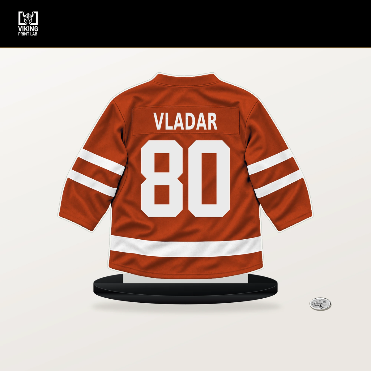 Dan Vladar number 80 Philadelphia Flyers jersey stand with included black base.