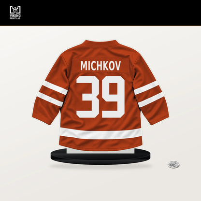 Matvei Michkov number 39 Philadelphia Flyers jersey stand with included black base.