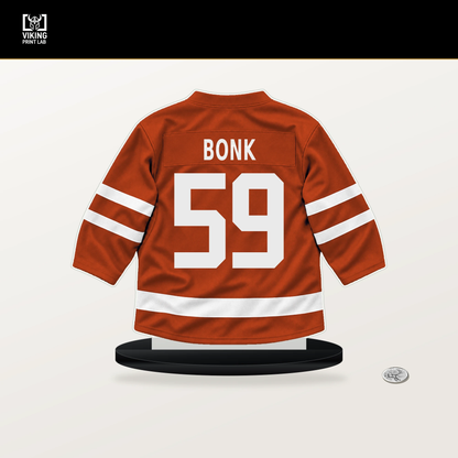 Oliver Bonk number 59 Philadelphia Flyers jersey stand with included black base.